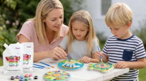kids decorating garden stepping stones with mosaic tiles and paint
